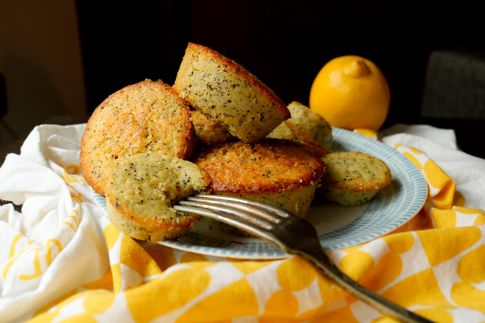 Lemon poppy seed muffins in a stack